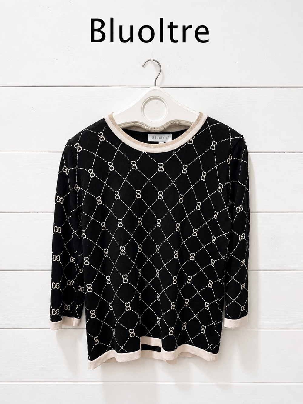 Elegant knit top by Bluoltre, size M/L. Black